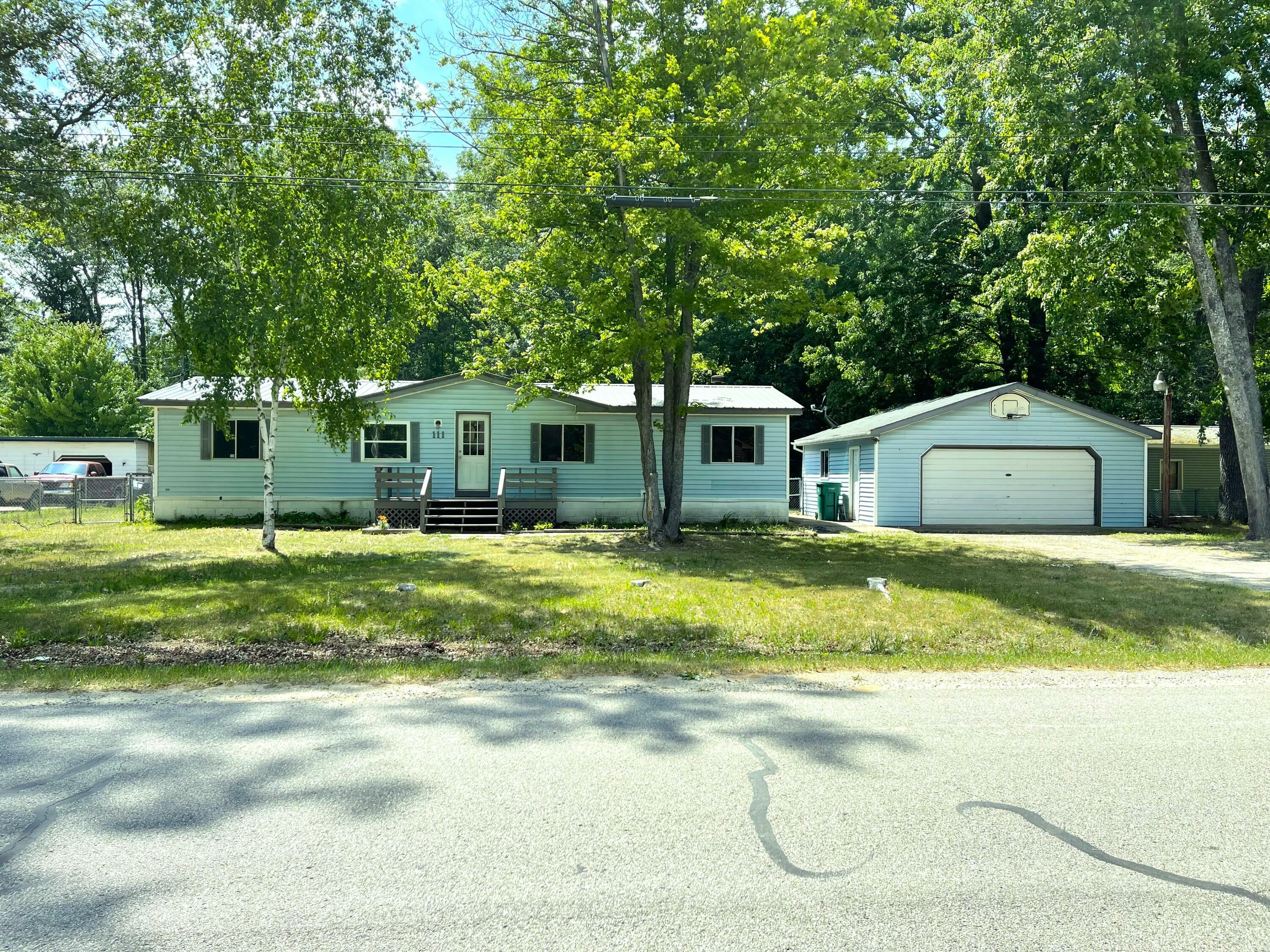 Property Photo:  111 Forest Park  MI 48629 