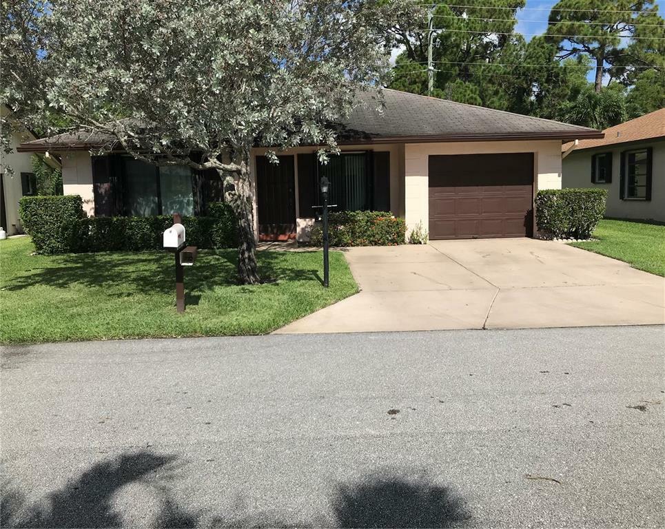 Property Photo:  6335 Tall Cypress Circle  FL 33463 