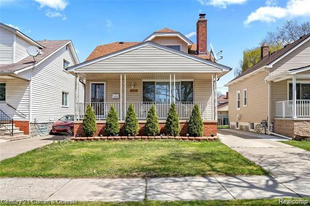 Property Photo:  6910 Maple Street  MI 48126 