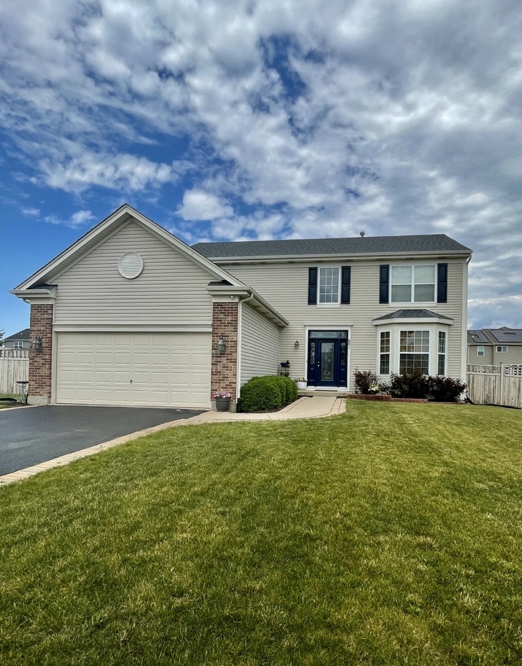 Property Photo: 601 Sutton Street IL 60560