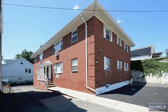 Property Photo:  309 Haledon Avenue  NJ 07508 