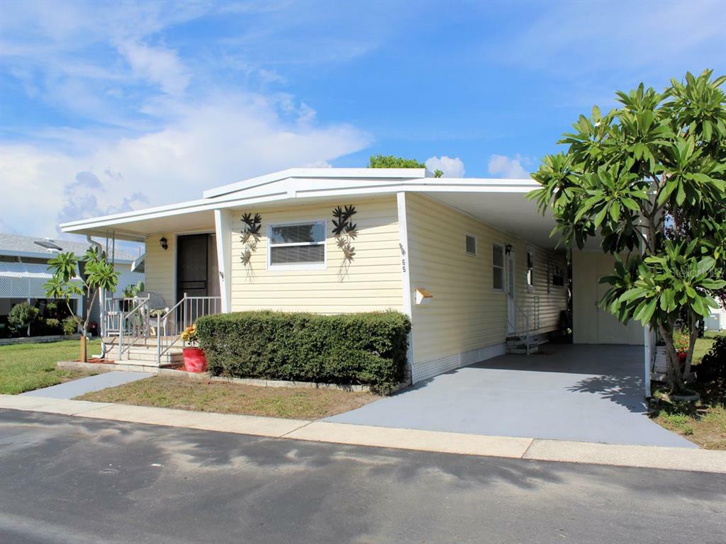 Property Photo:  65 Pindo Palm Street W  FL 33770 