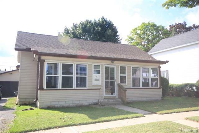 Property Photo:  121 Law Street  MI 48446 