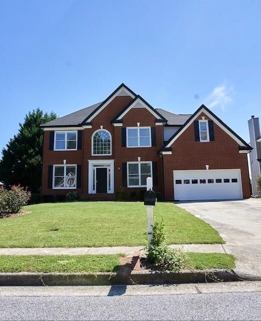 Property Photo: 345 High Hardin Way GA 30043