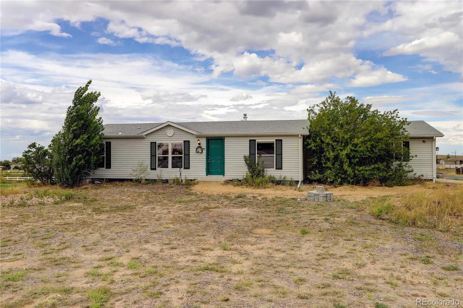 Property Photo: 7119 Jade Street CO 80621