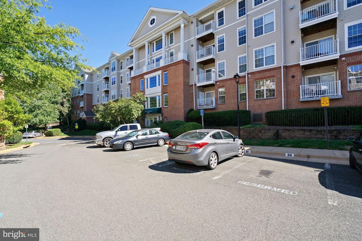 Property Photo:  7011 Falls Reach Drive 202  VA 22043 