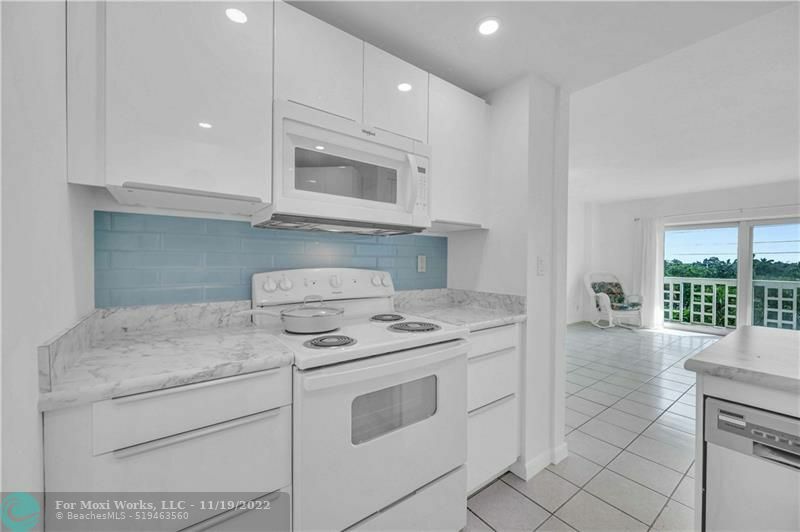 Property Photo:  1831 NE 38th St 408  FL 33308 