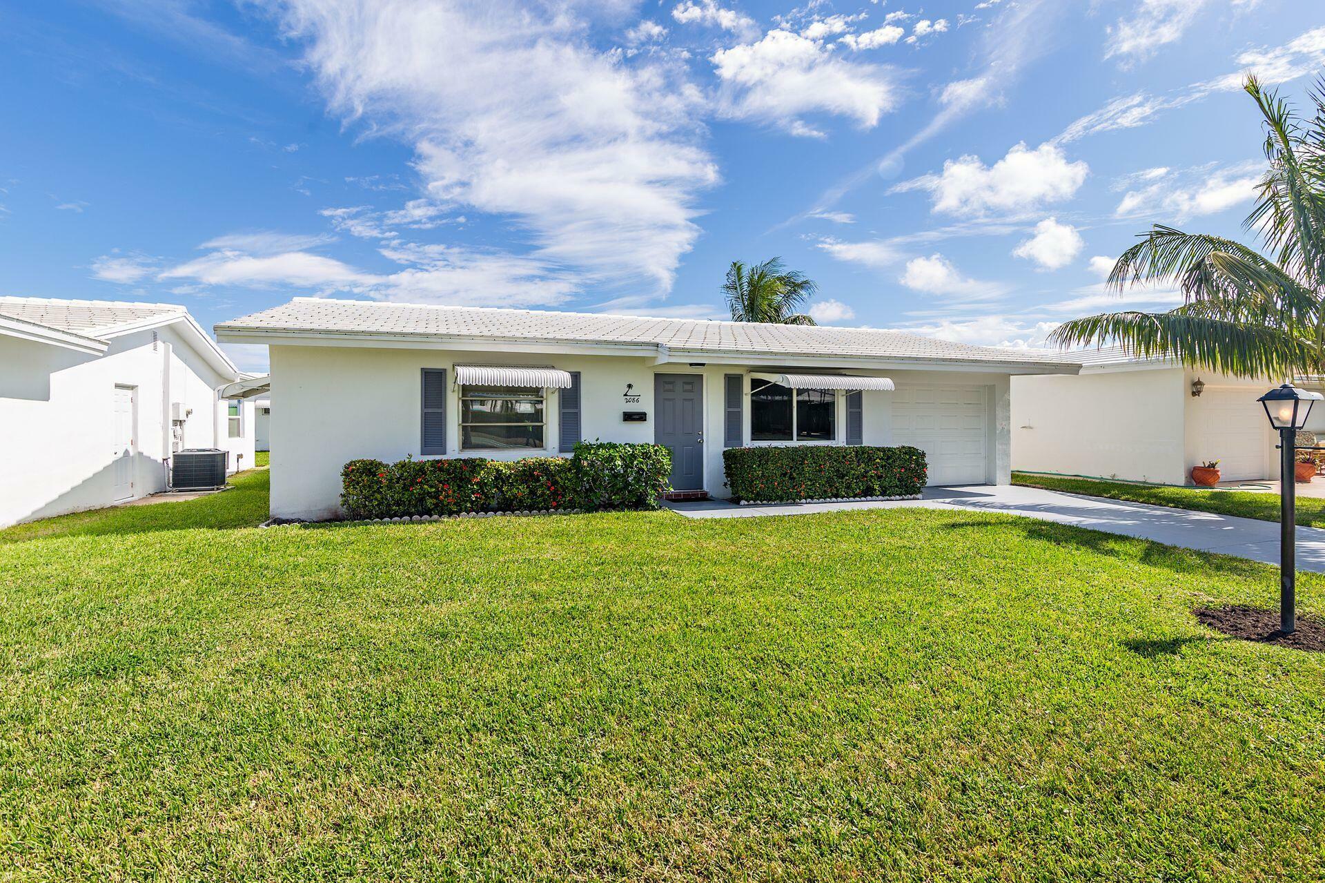 Property Photo:  2086 SW Park Drive  FL 33426 