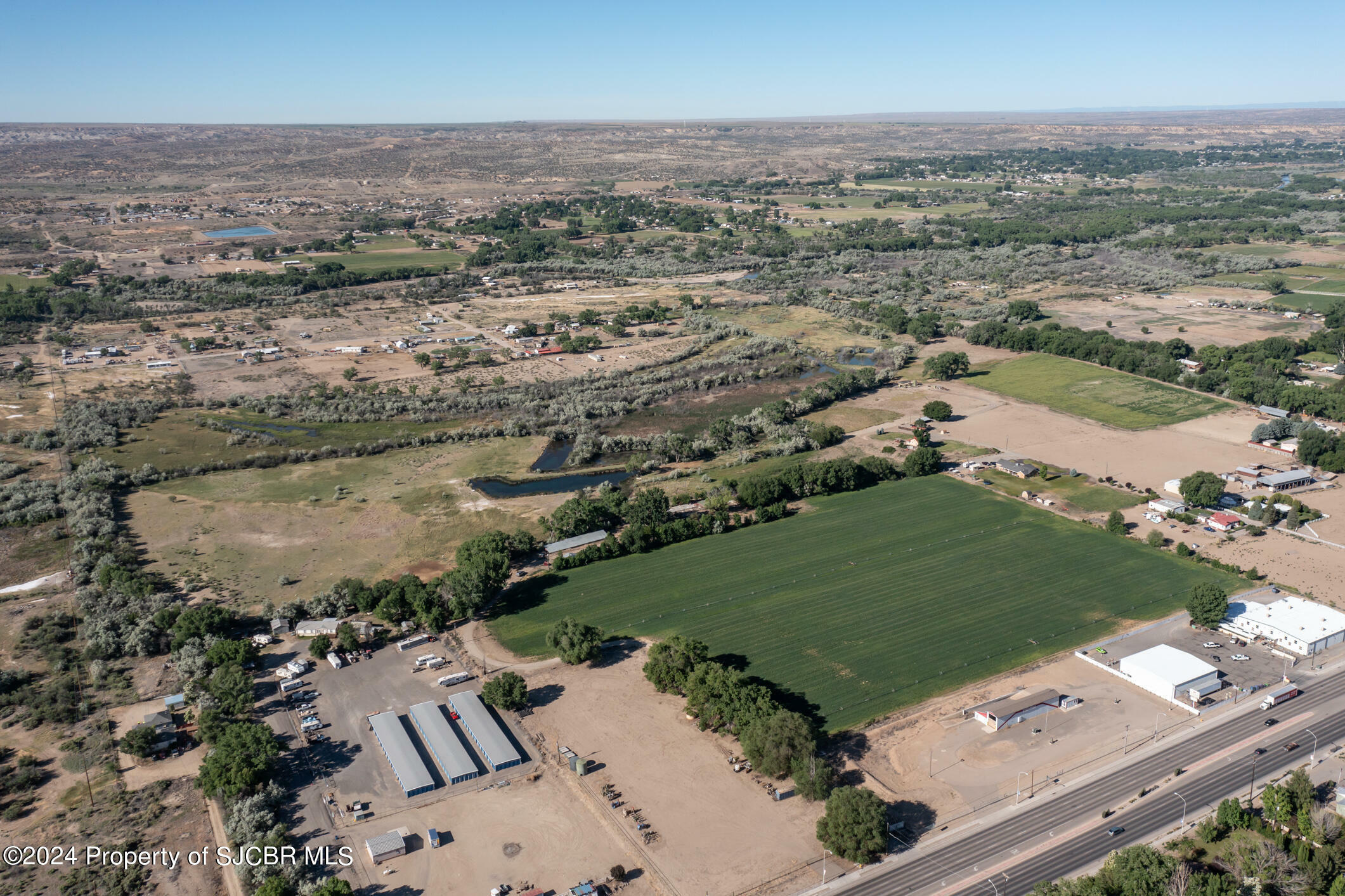 Property Photo:  1927/1929 W Broadway Avenue  NM 87413 