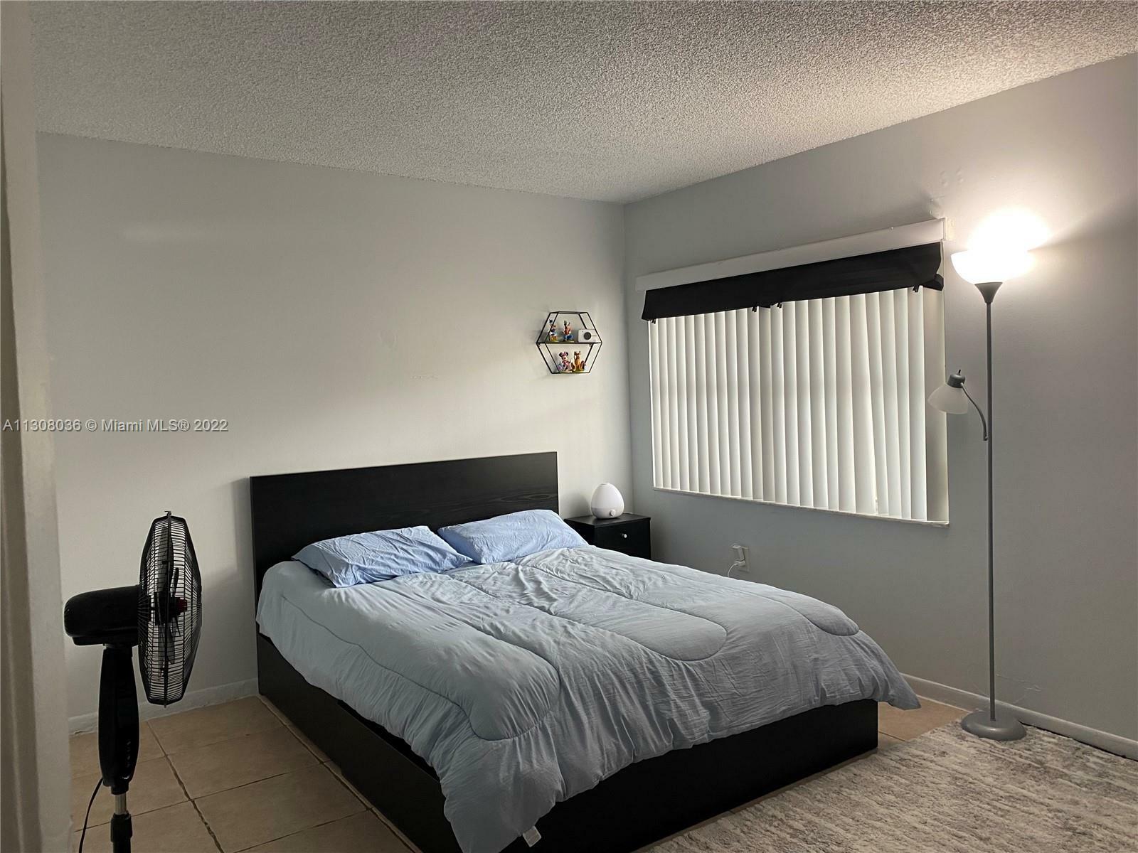 Property Photo:  8615 NW 5th Ter 14-103  FL 33126 