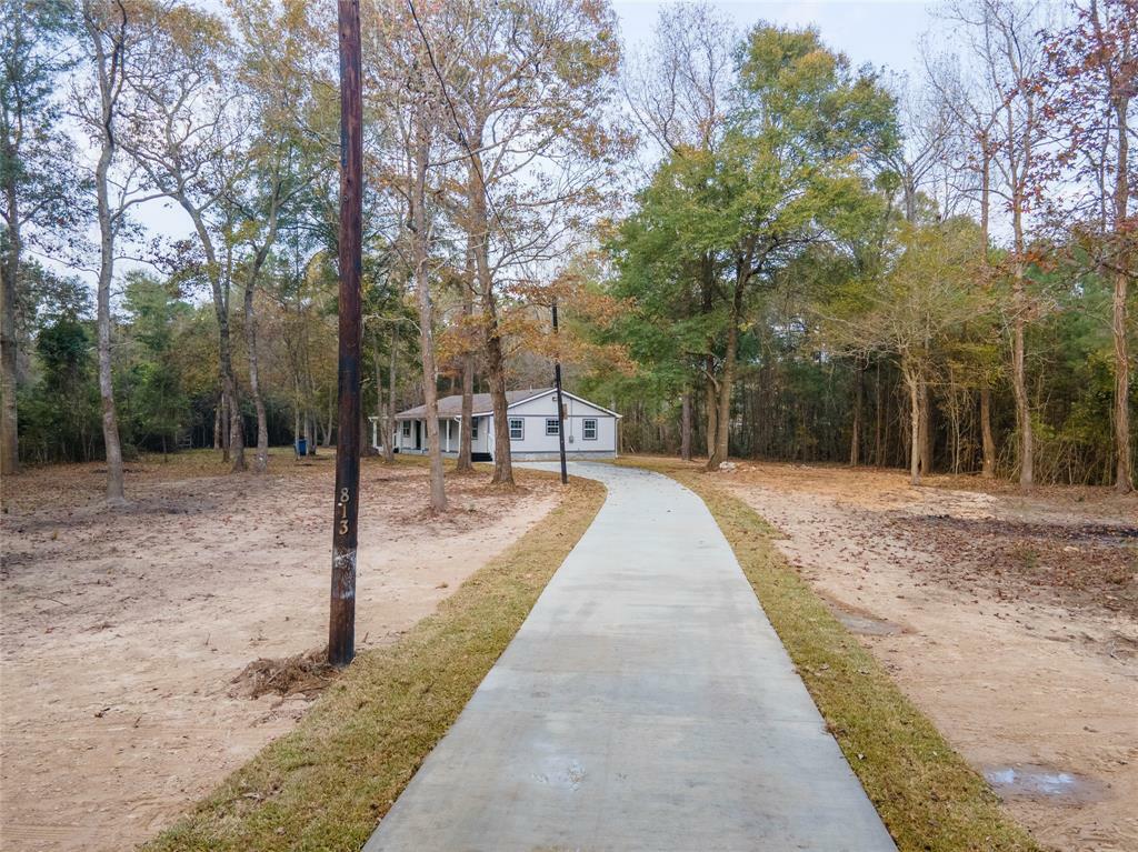 Property Photo:  813 County Road 343  TX 77327 