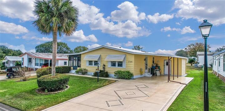 Property Photo: 1709 Pebble Beach Lane FL 32159