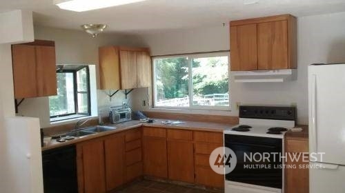 Property Photo:  3121 E Grapeview Loop Road  WA 98546 