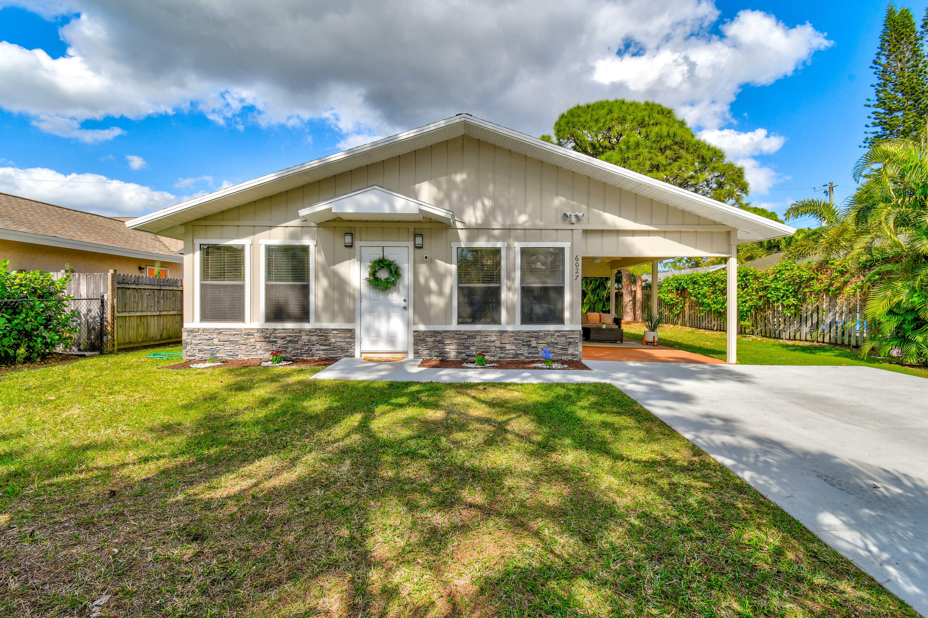 Property Photo:  6027 Roger Street  FL 33458 