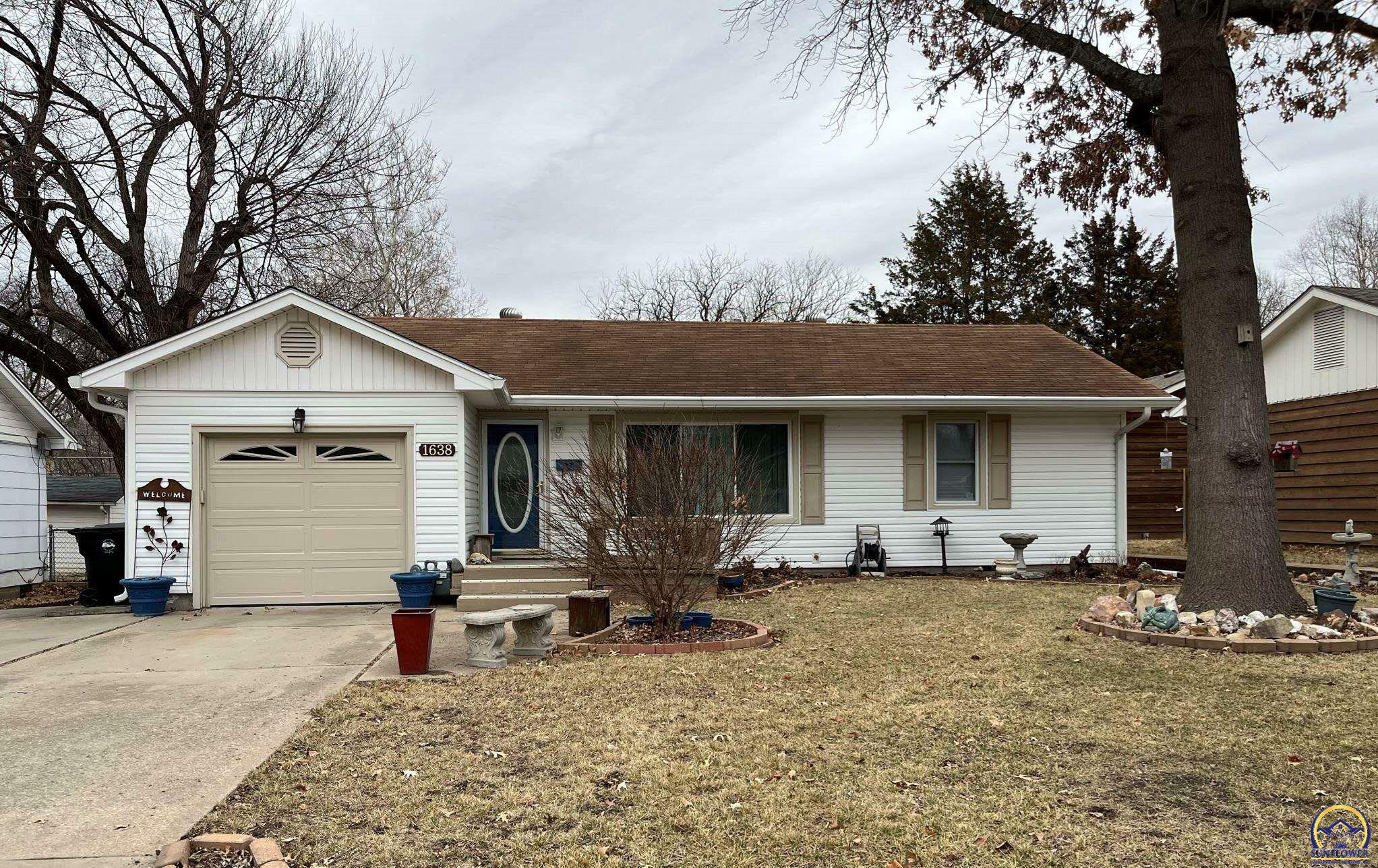 Property Photo:  1638 SW Burnett Rd  KS 66604 