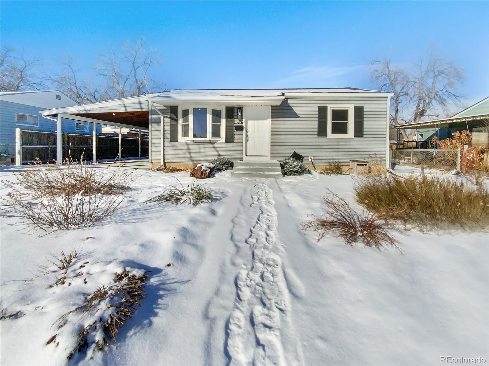 Property Photo: 1415 S Newton Street CO 80219