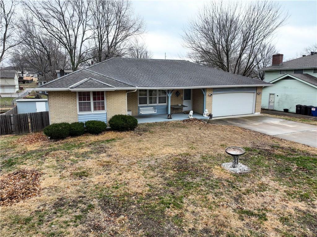 Property Photo:  7303 N Woodland Avenue  MO 64118 