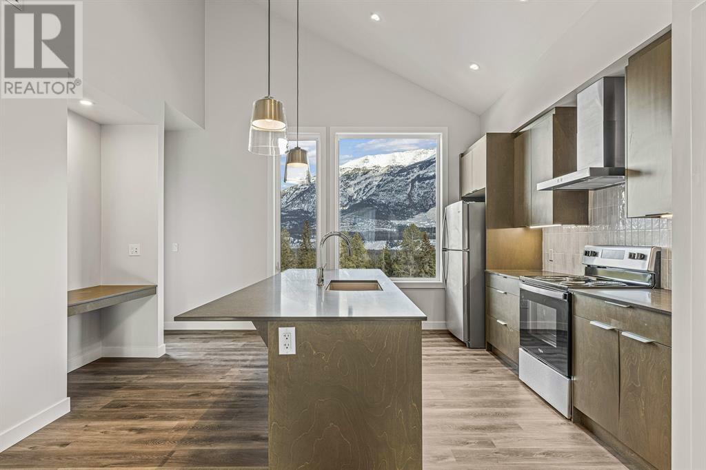 Property Photo:  209 Stewart Creek Rise  AB T1W0G6 