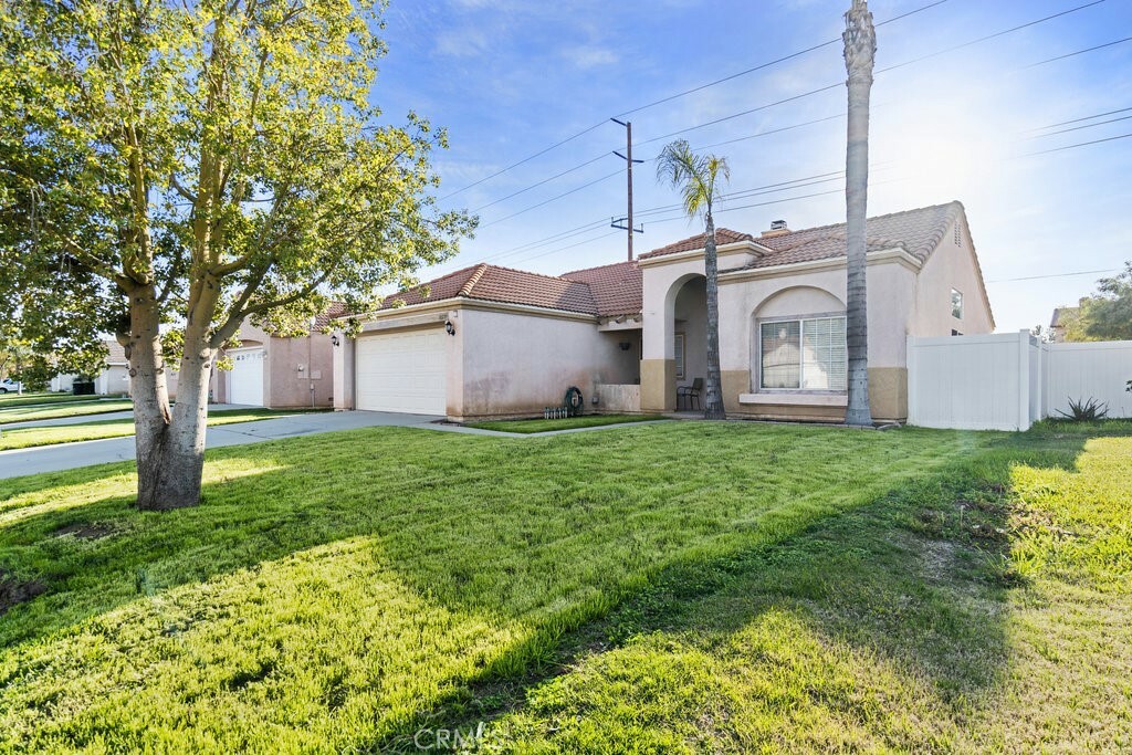 Property Photo: 16299 Abedul Street CA 92551