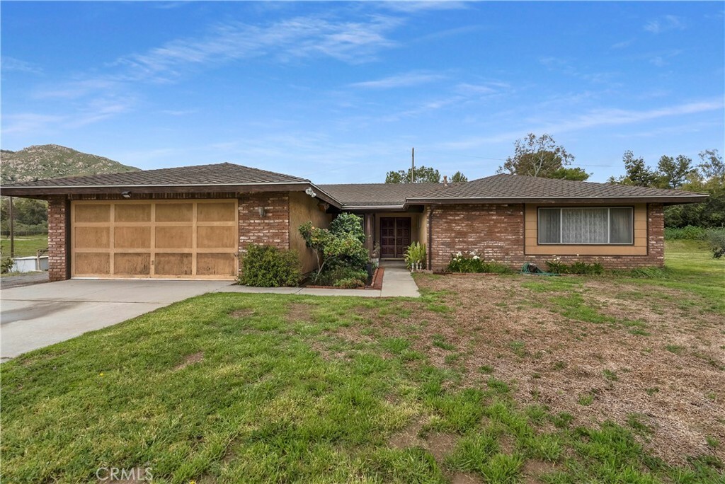 Property Photo:  9095 Peoria Lane  CA 92557 