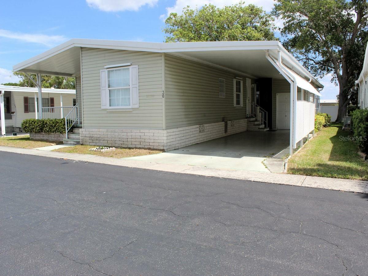 Property Photo:  30 Pindo Palm Street E  FL 33770 