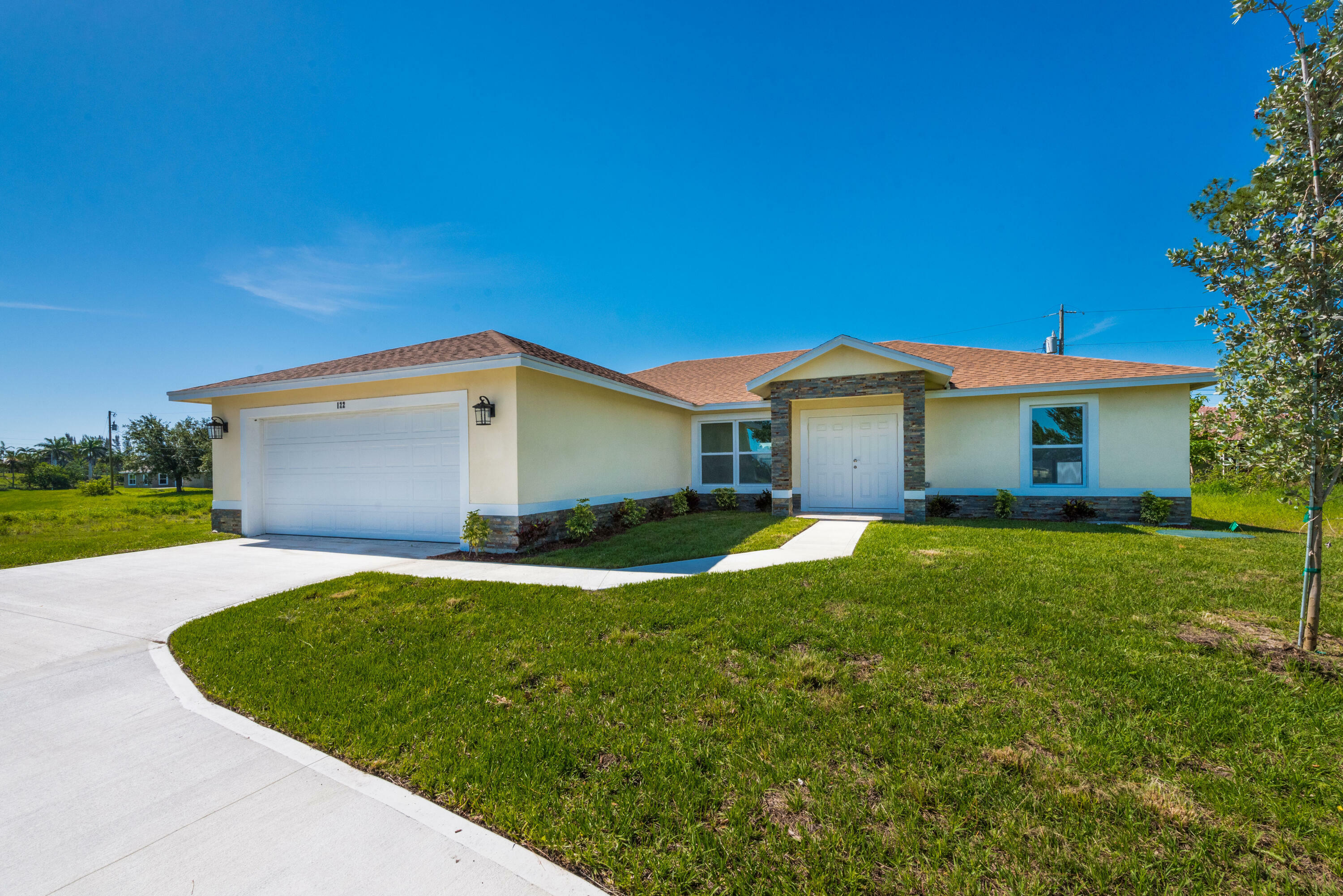 Property Photo: 122 SW Becker Road FL 34953