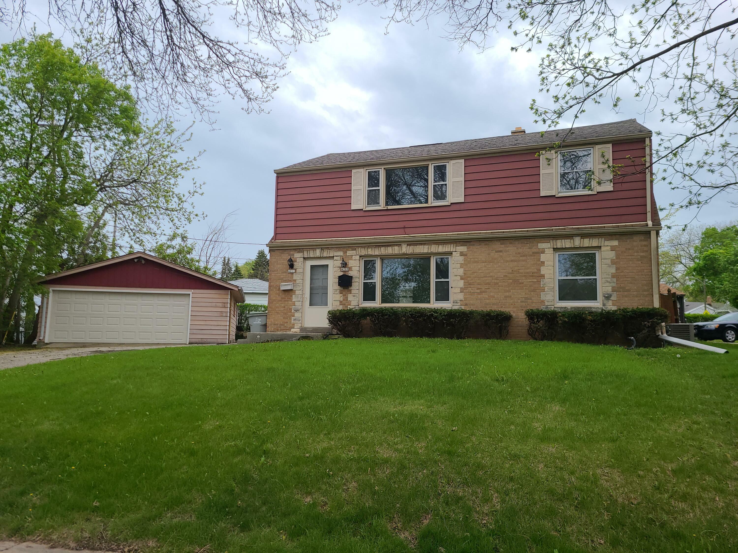 Property Photo:  4209 S Whitnall Ave  WI 53207 