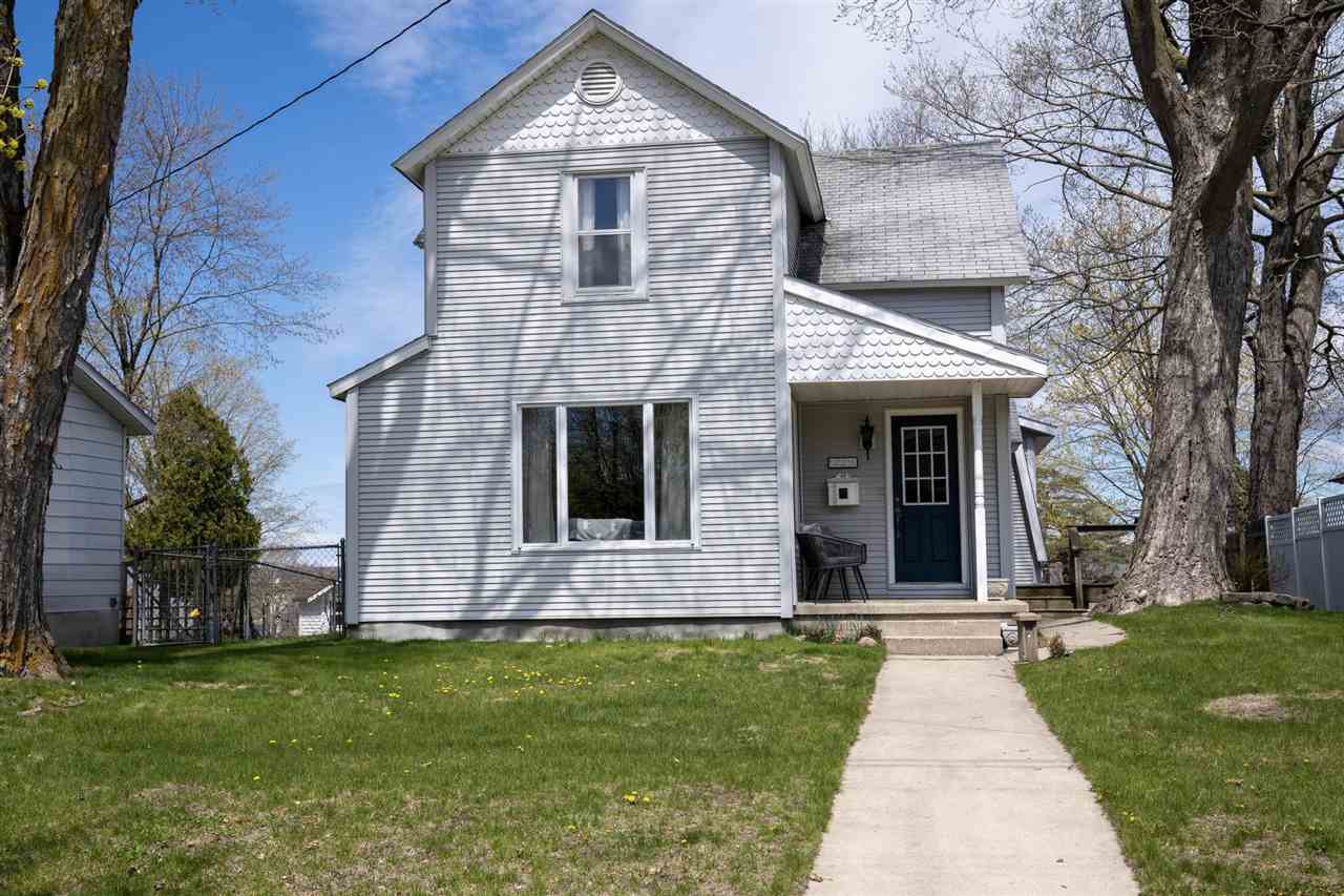 Property Photo:  320 Jackson  MI 49770 