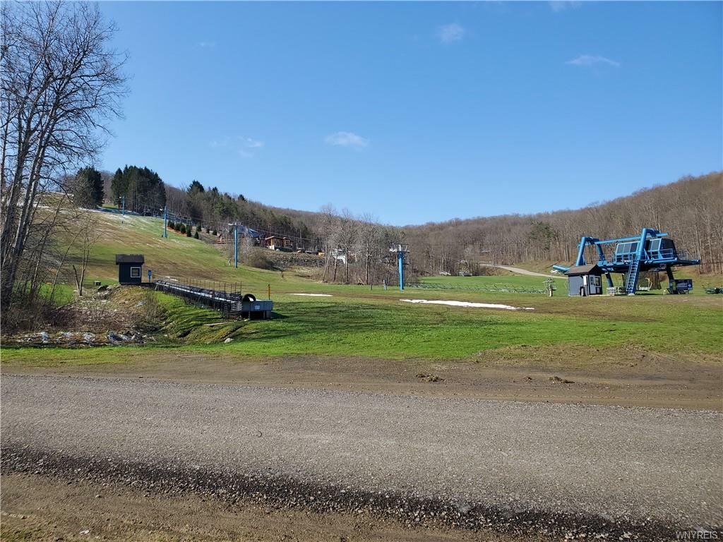 Property Photo: 131-136 Woods Rd-The Woods NY 14731