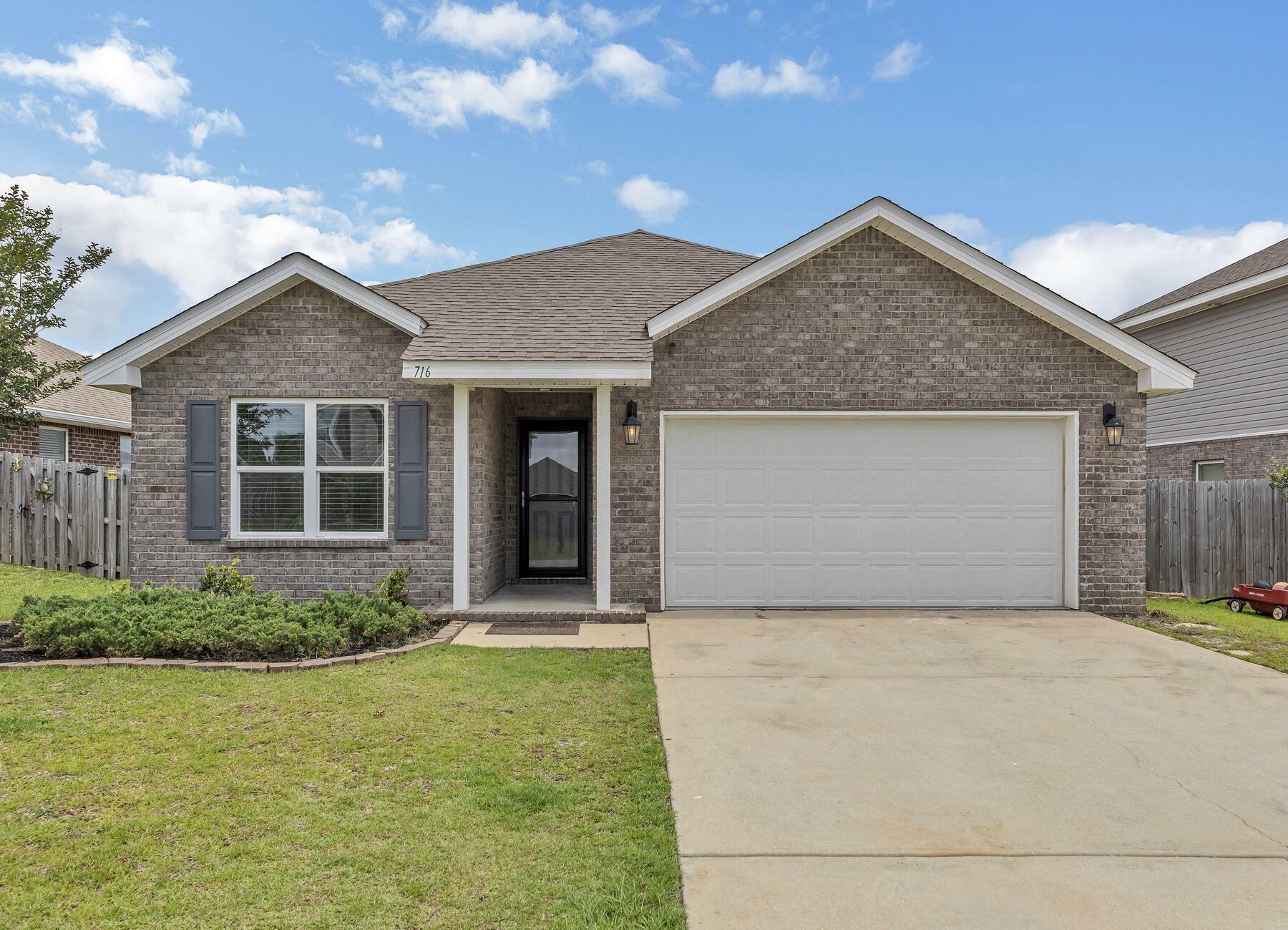 Property Photo:  716 Widgeon Way  FL 32539 