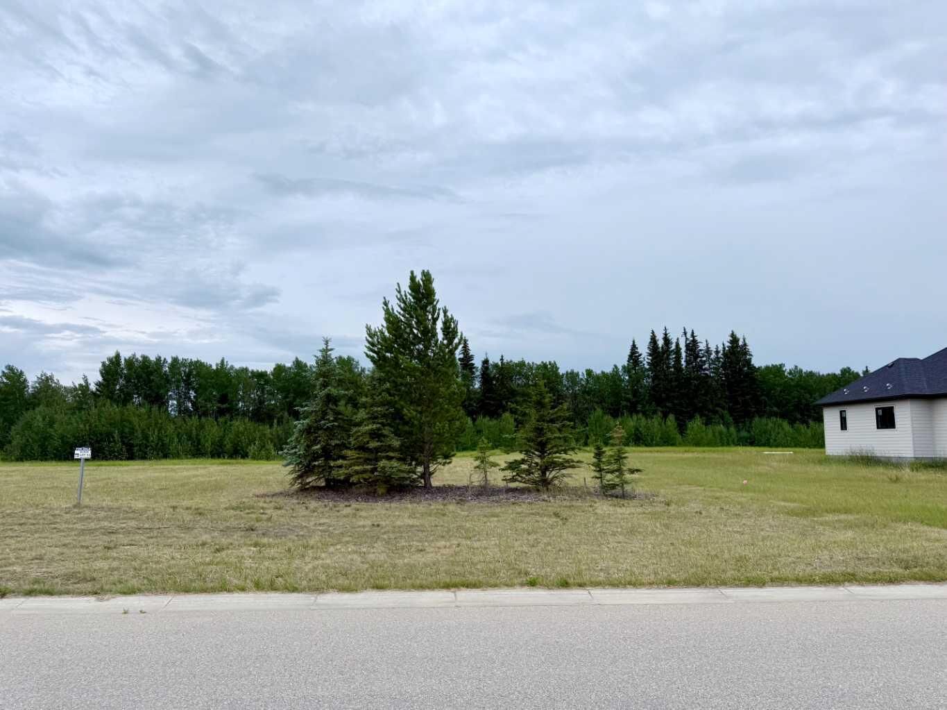 Property Photo: 7943 Creekside Drive AB T8W 0H3