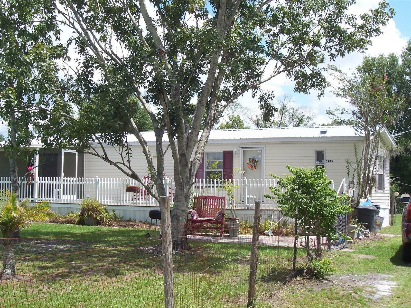 Property Photo:  3905 NW Green Tree Street  FL 34266 