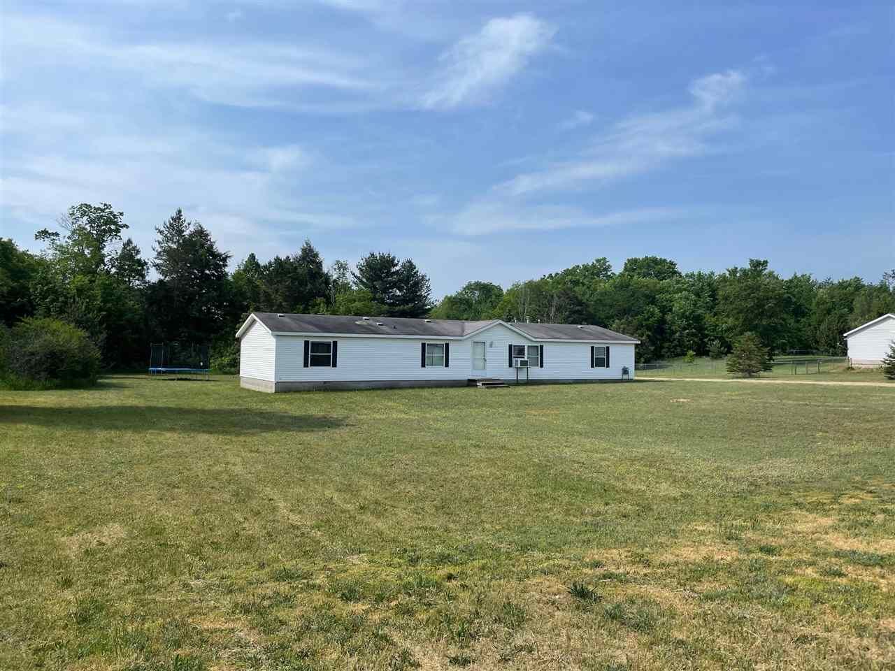 Property Photo:  505 W Division  MI 49659 