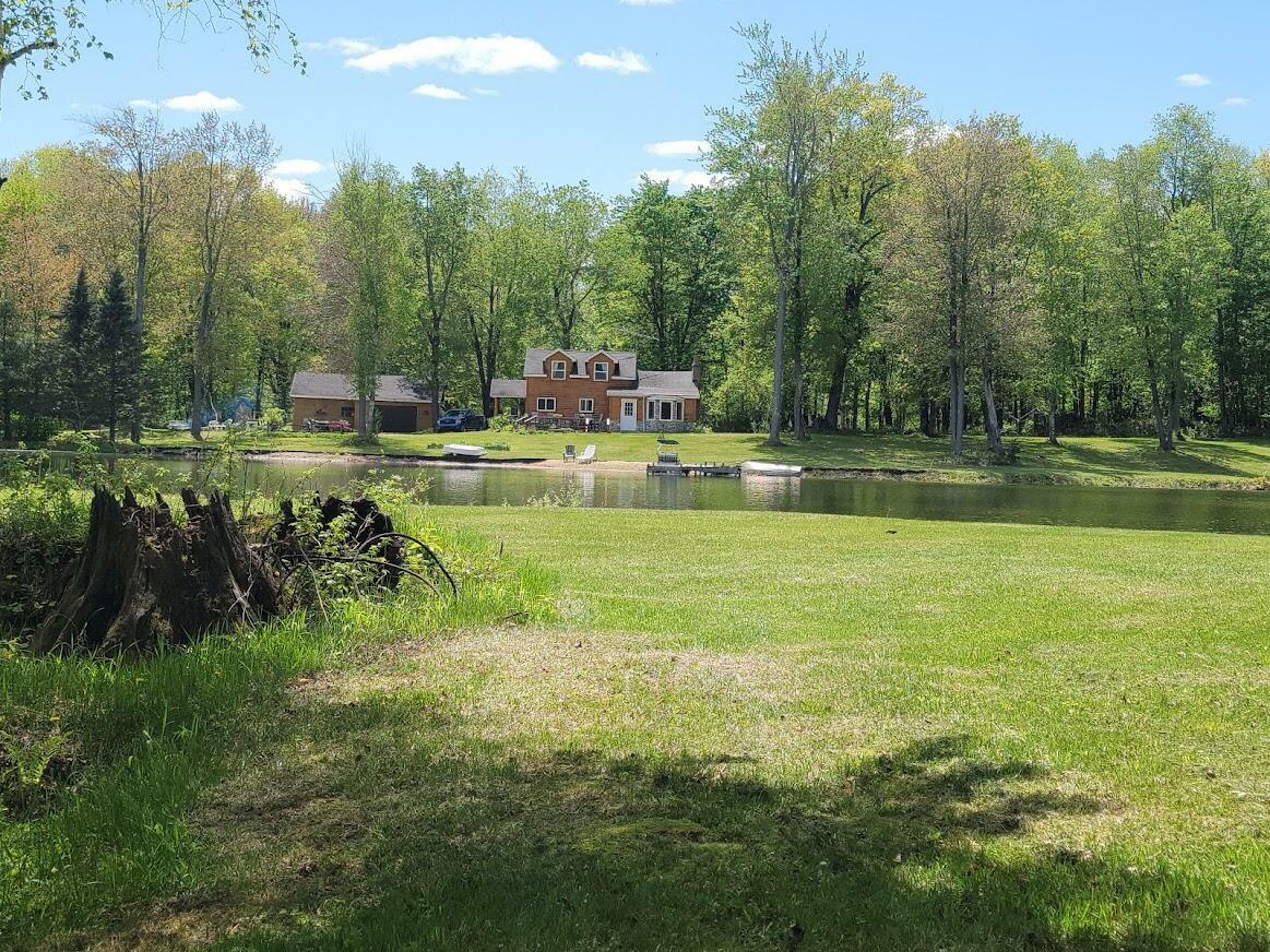 Property Photo:  11001 Little George Lake Road  MI 48624 