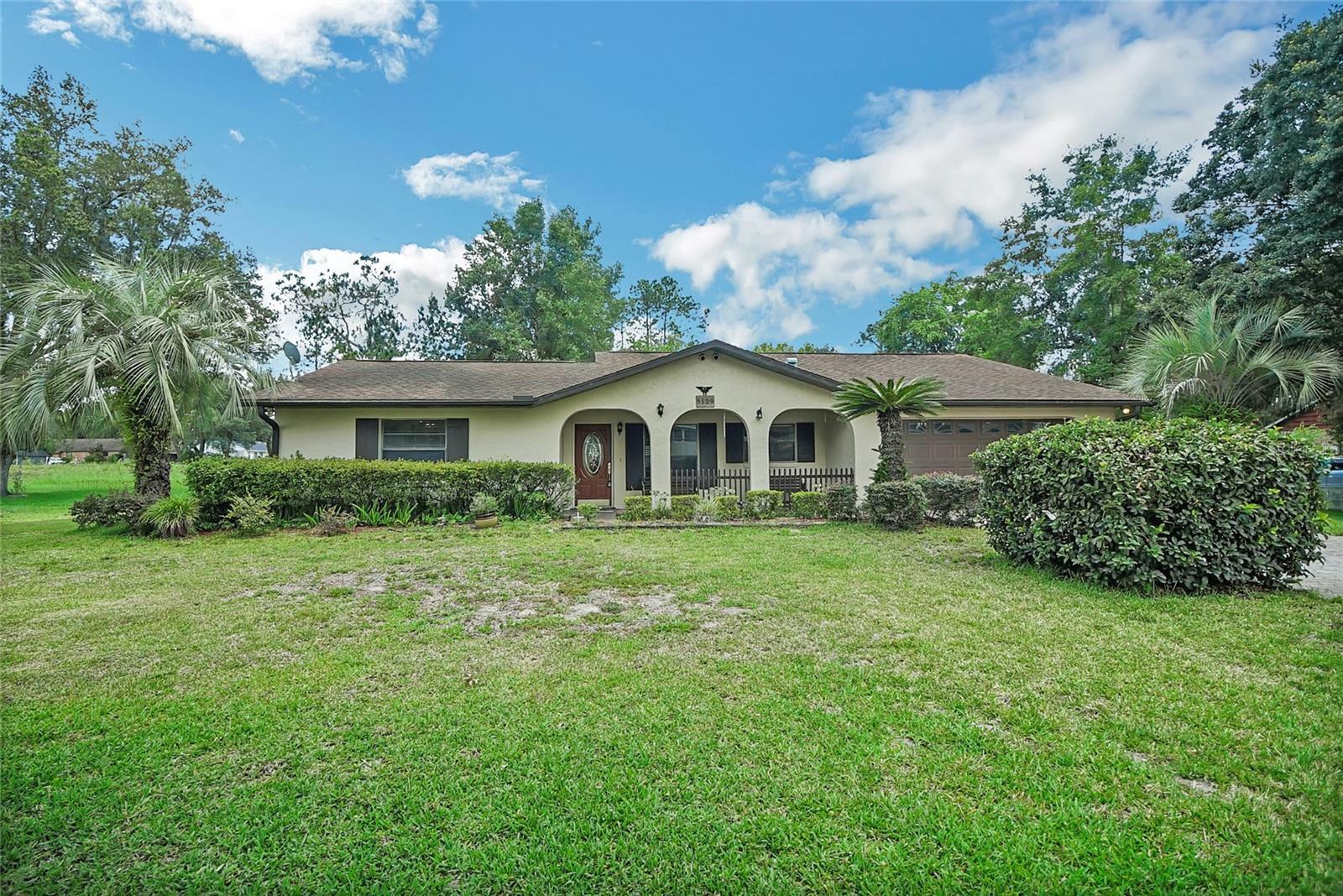 Property Photo:  5129 County Road 114  FL 34785 