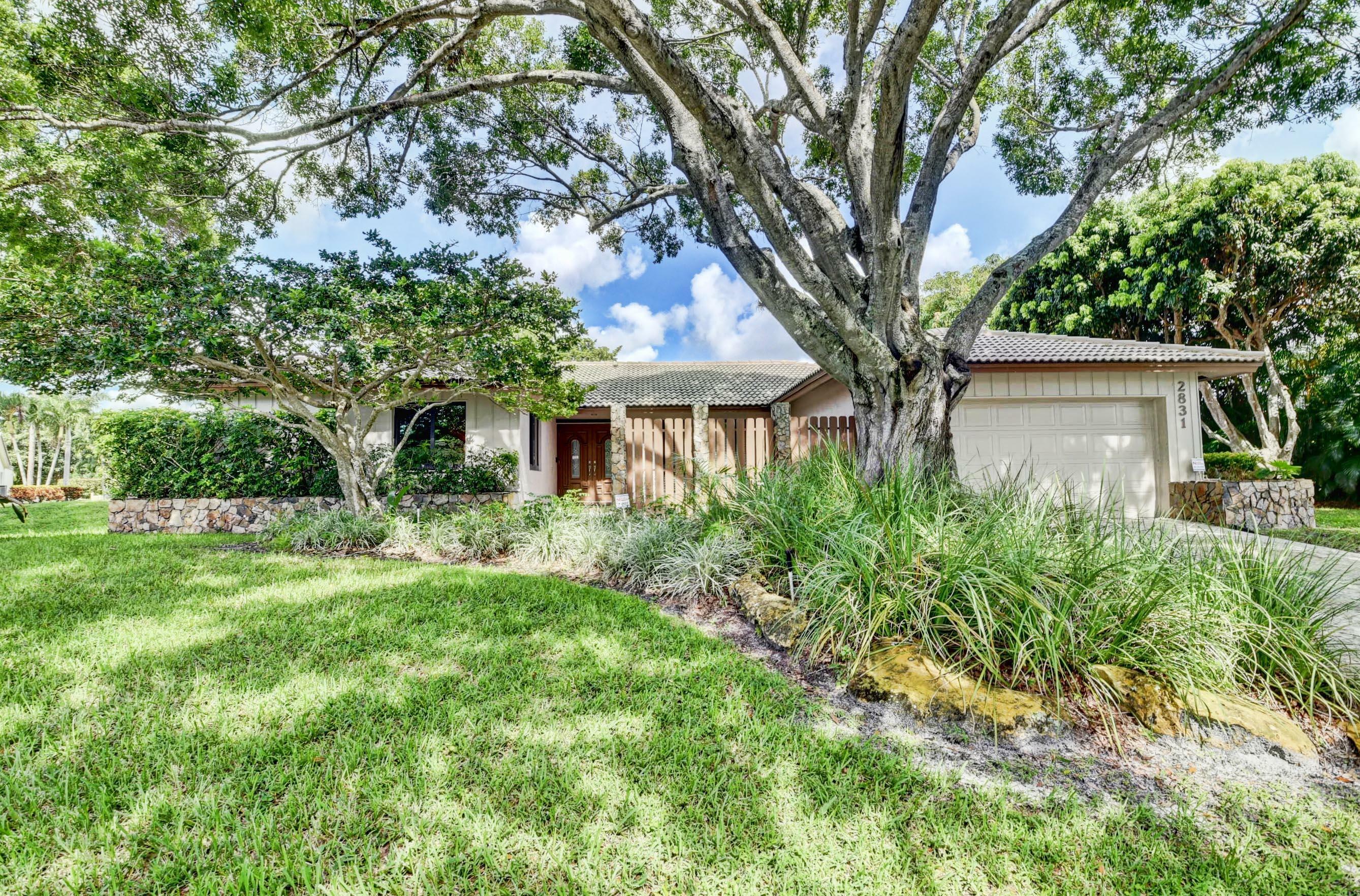 Property Photo:  2831 NW 23rd Court  FL 33431 