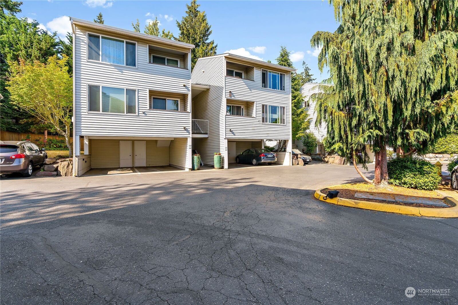 Property Photo:  20301 19th Avenue NE 922  WA 98155