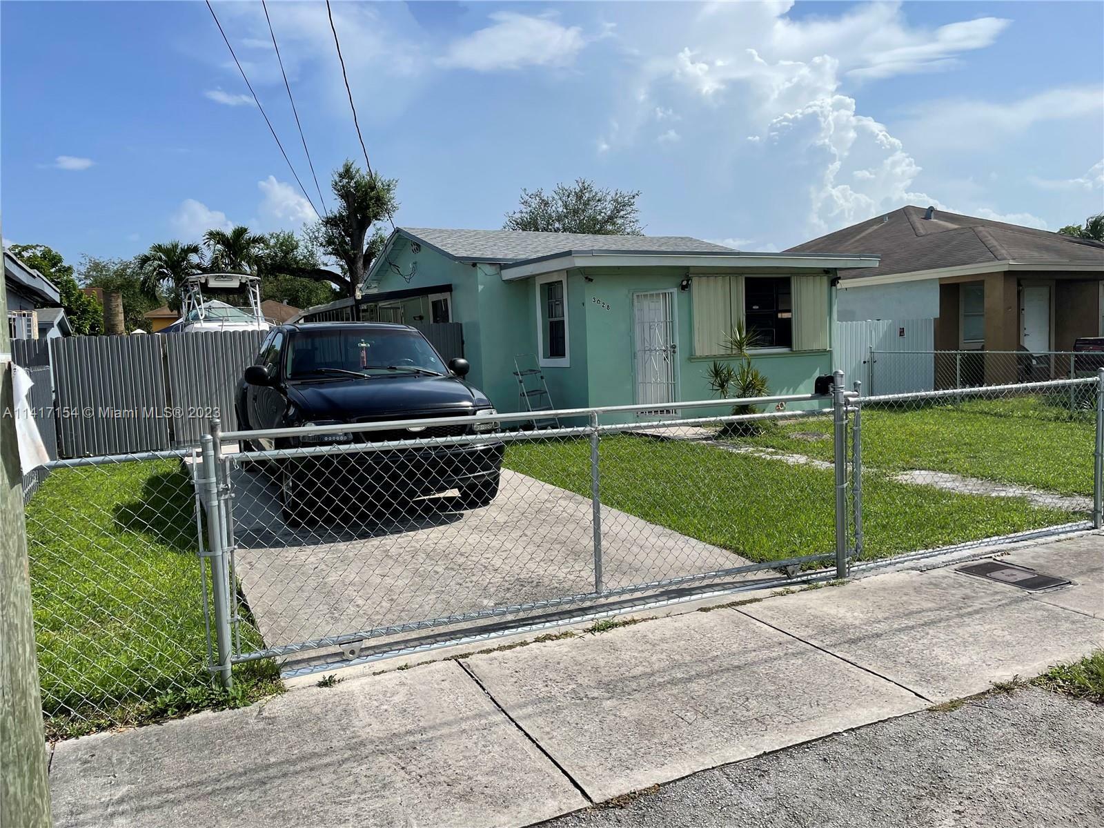 3028 NW 67th St  Miami FL 33147 photo