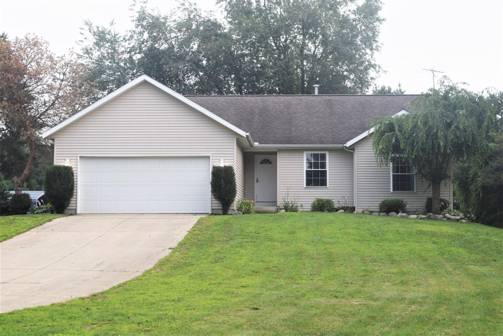 Property Photo:  11900 Stultz Street NE  MI 49341 