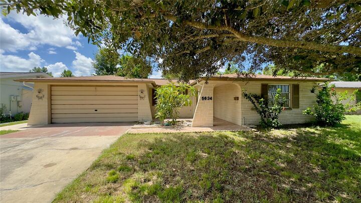 Property Photo:  5634 Dahlia Avenue  FL 34652 