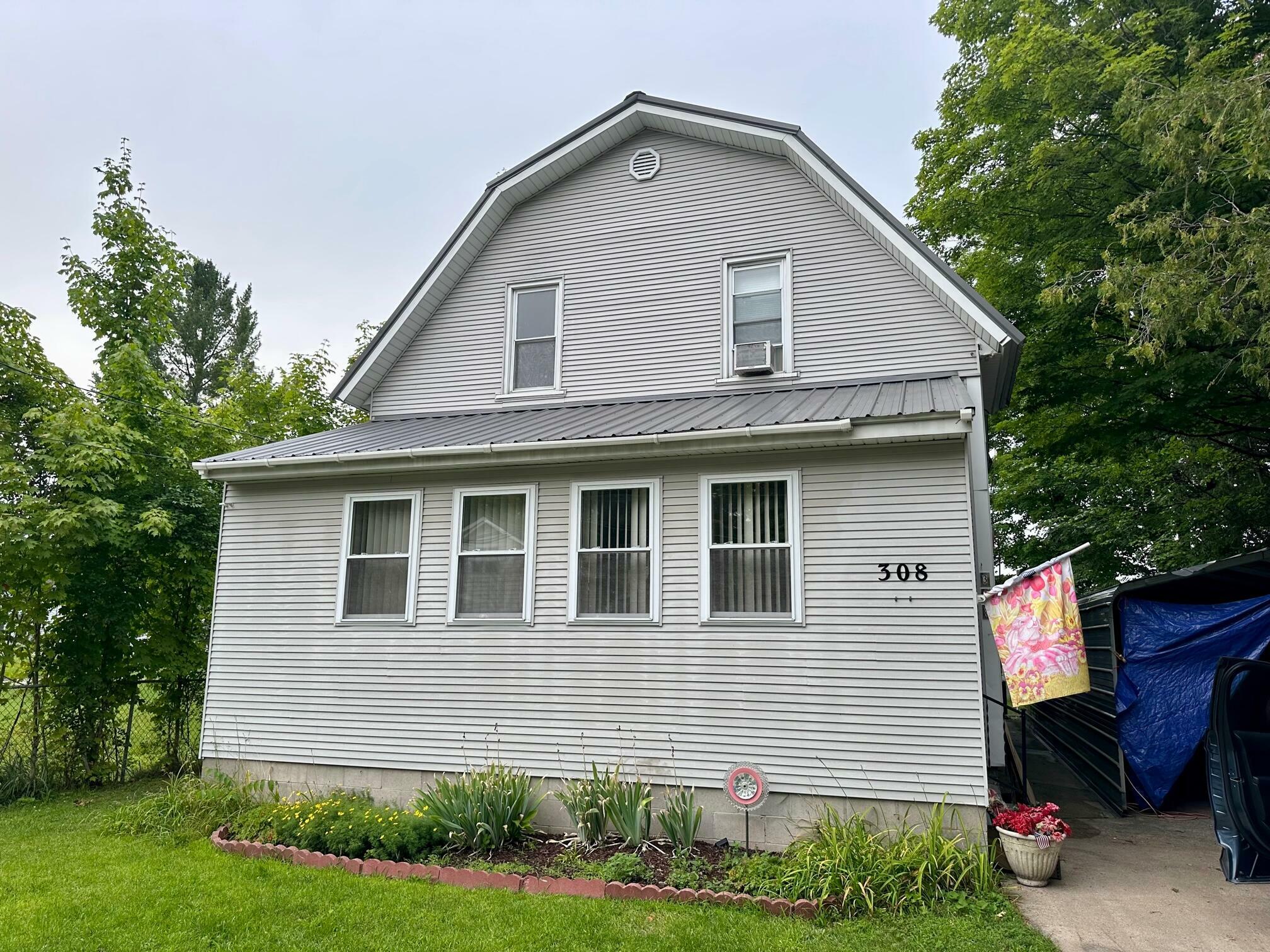 Property Photo:  308 W 6th Street  MI 49631 