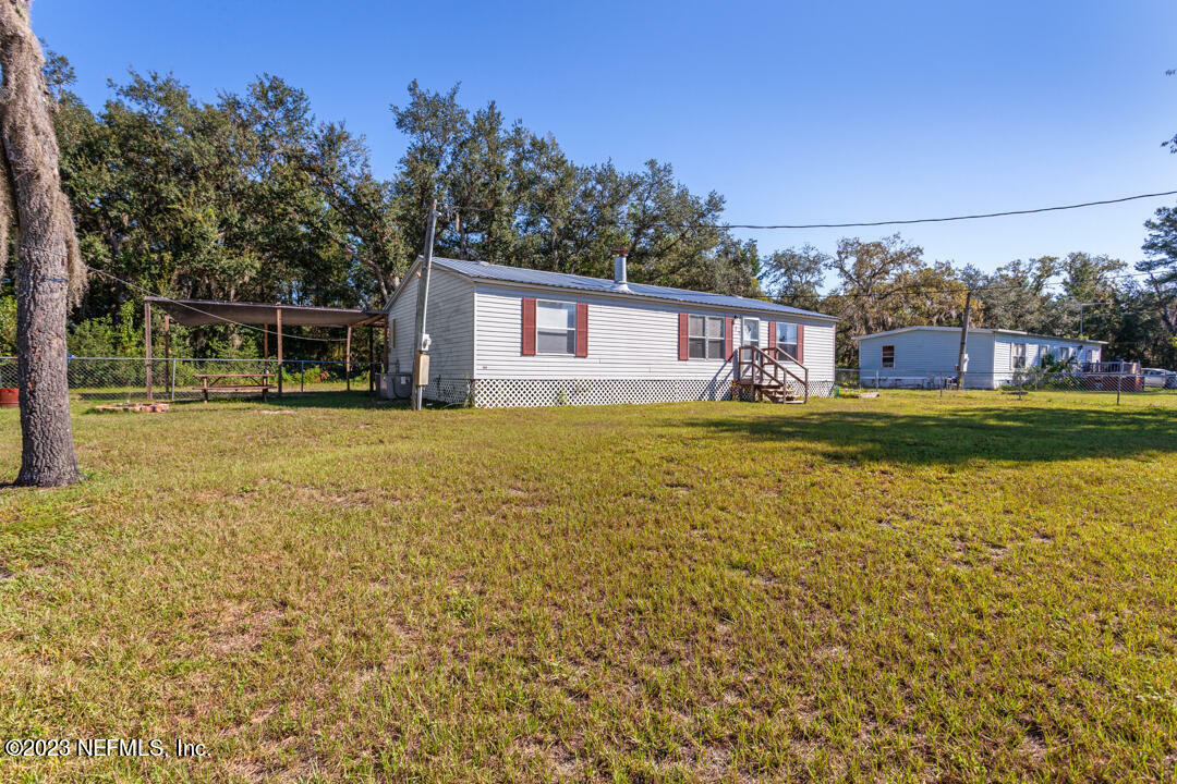 Property Photo:  123 Violet Circle  FL 32148 