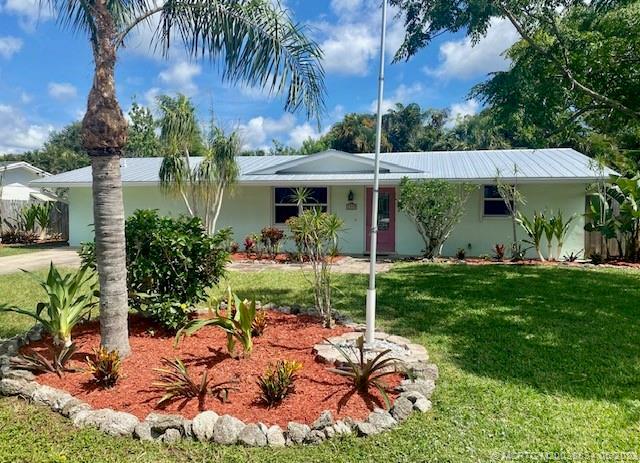 Property Photo:  1859 NW Azalea Street  FL 34994 