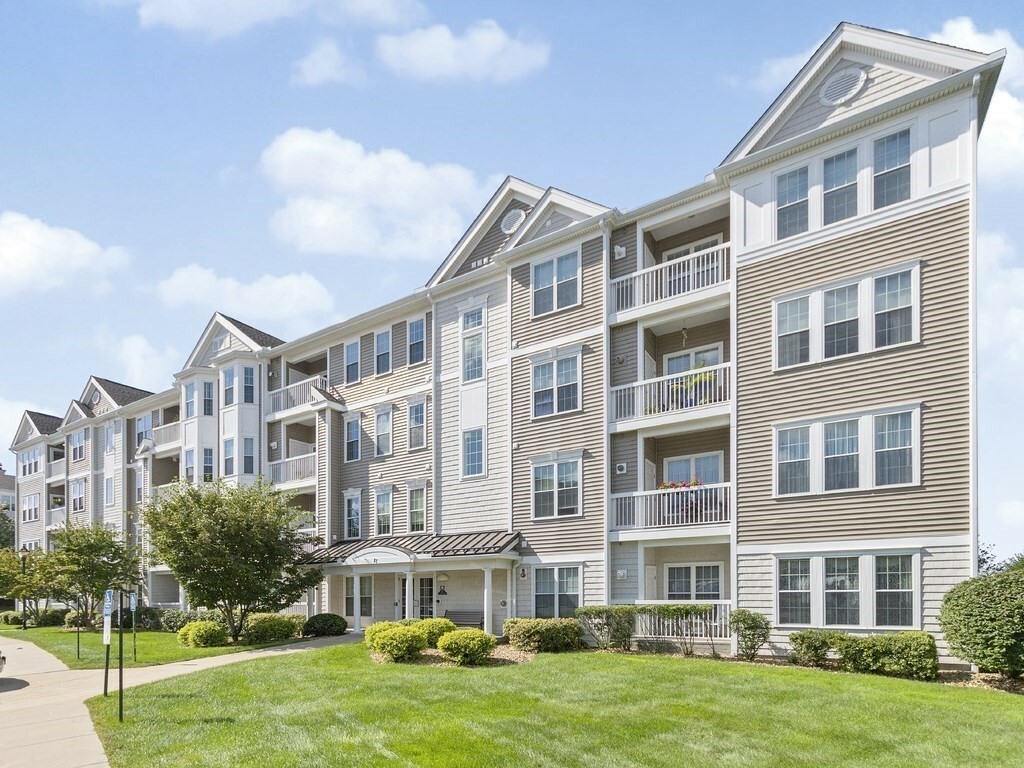 Property Photo: 87 Clocktower Drive 402 MA 02452