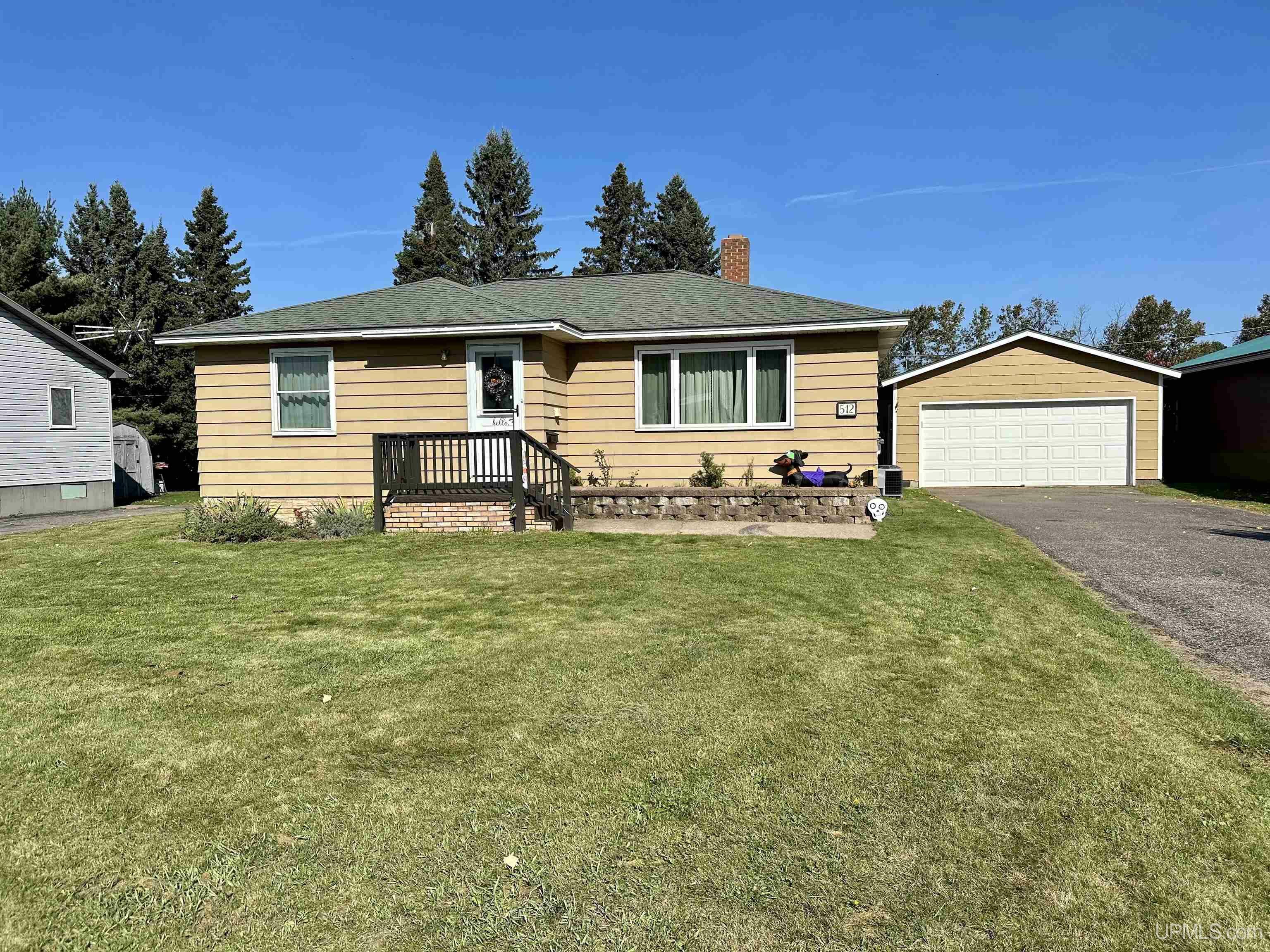 Property Photo:  512 W Division  MI 49849 