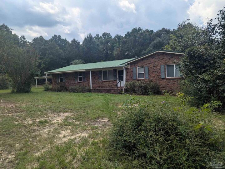 Property Photo: 8271 Mobile Hwy FL 32526