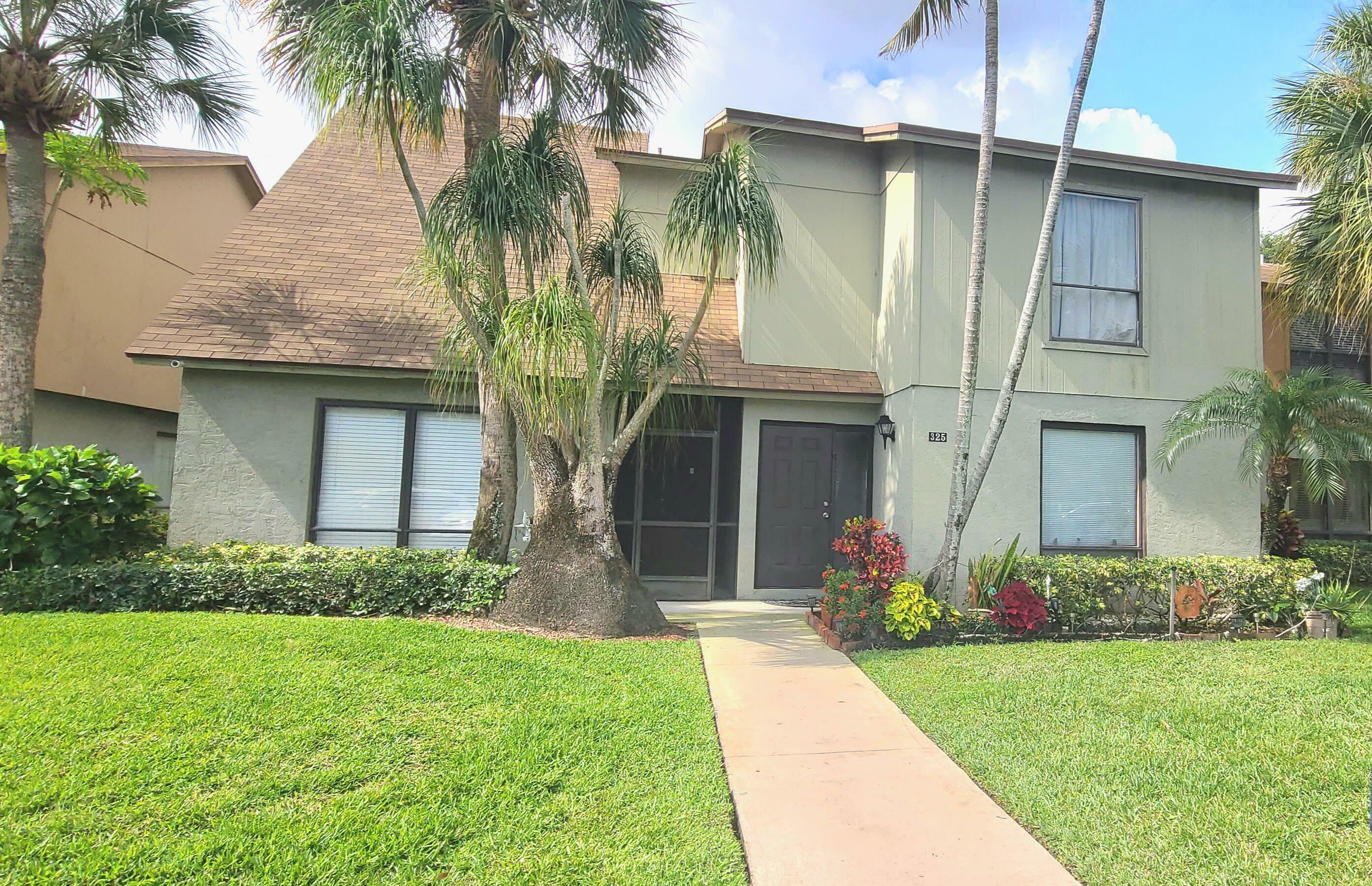 Property Photo:  325 Sandtree Drive  FL 33403 