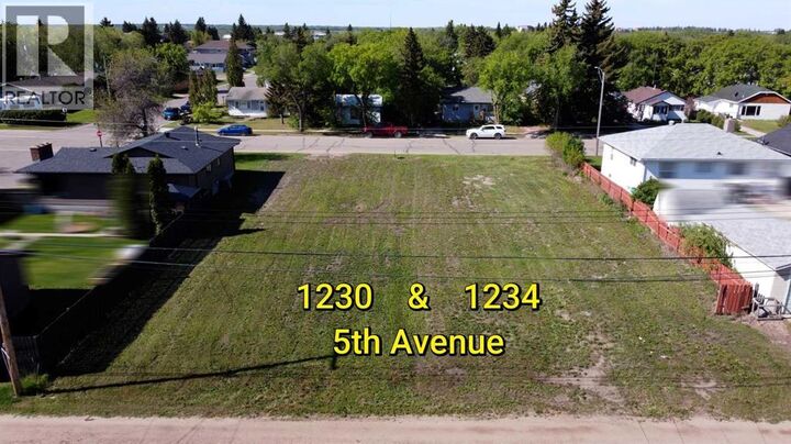 Property Photo:  301234 5 Avenue  AB T9W 1L8 