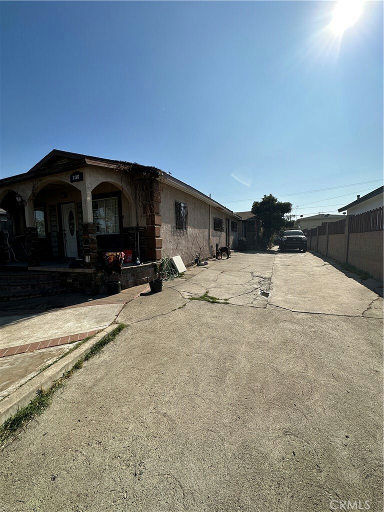 Property Photo:  230 W 113th Street  CA 90061 