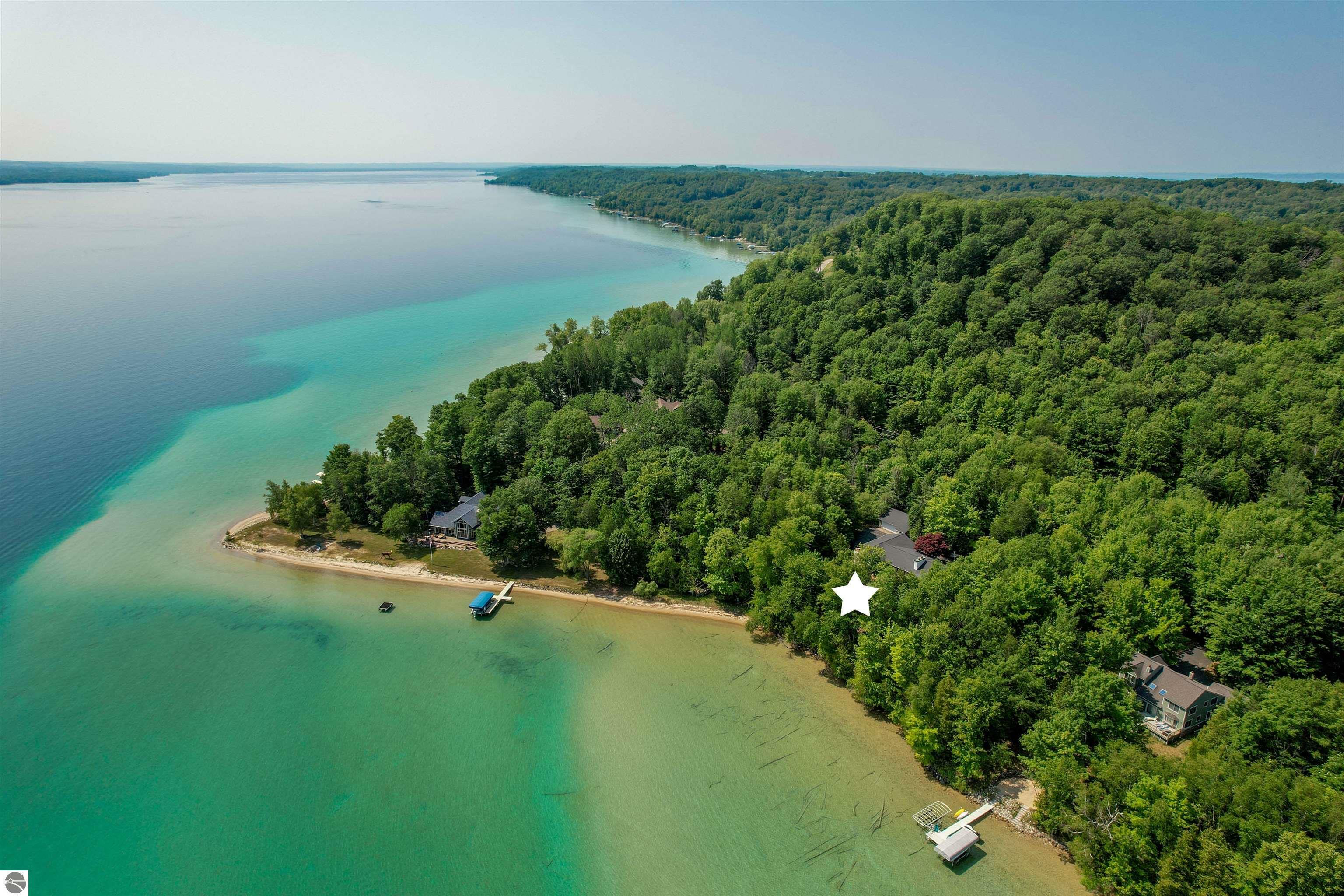 Property Photo:  3455 NW Torch Lake Drive  MI 49648 